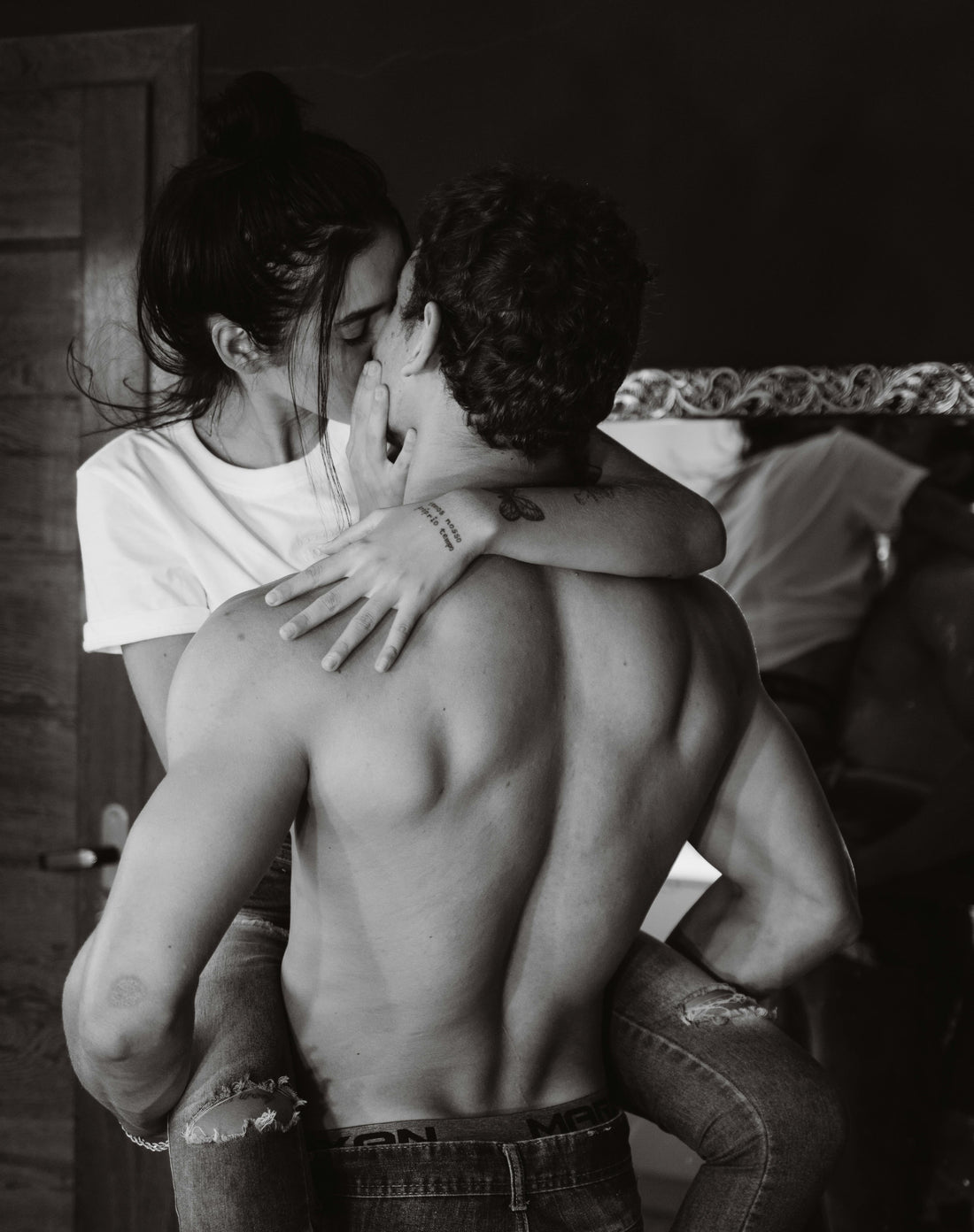 man and woman in passionate embrace